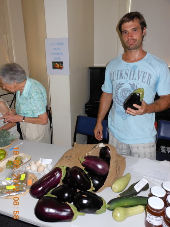 https://sustainablecommunitiessa.files.wordpress.com/2012/02/rob-with-eggplants.jpg