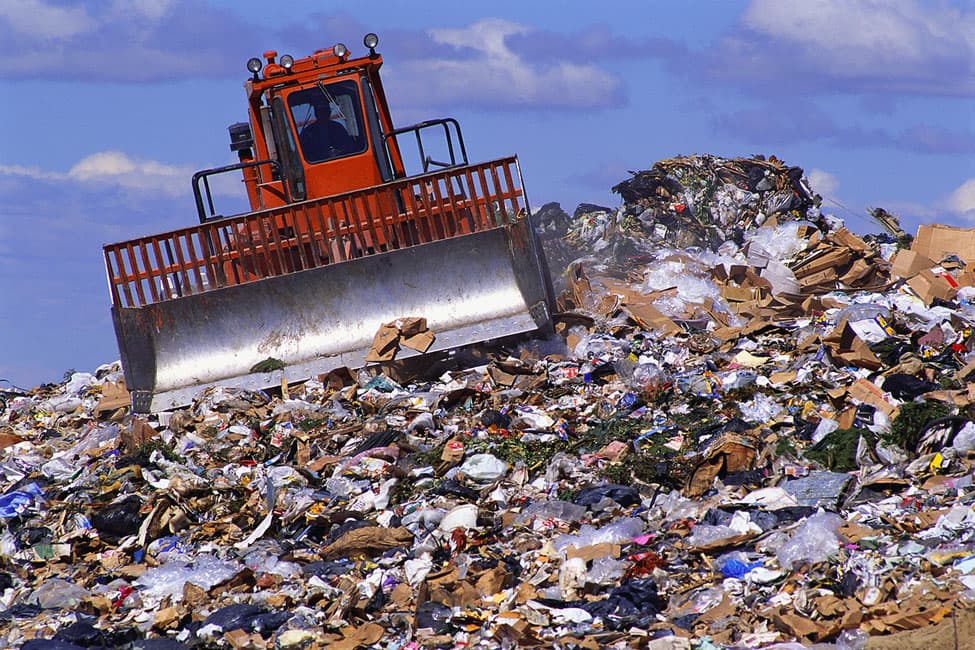 Orange Bulldozer in Landfill